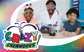 A logo and image of kids doing an experiment representing our Crazy Chemworks after-school program for kids ages 5 to 12.